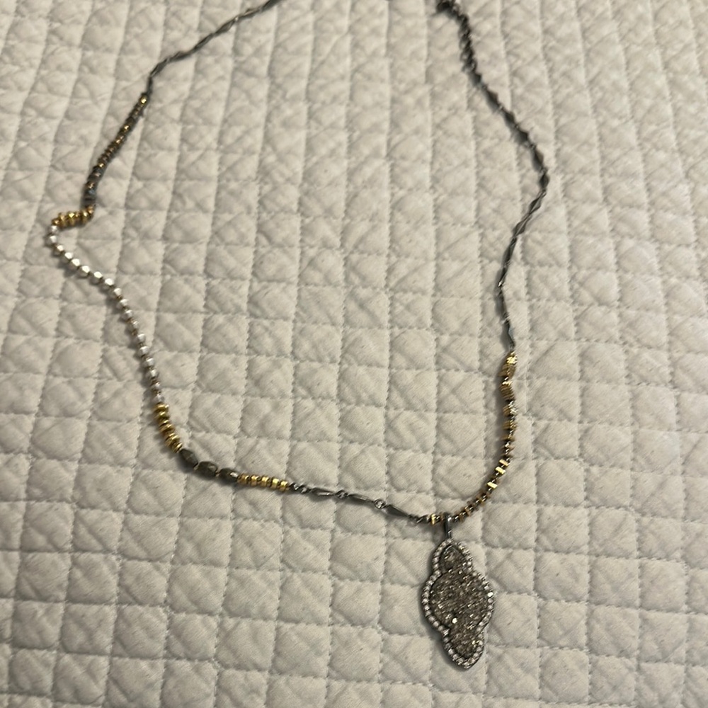 Elegant Gold and Silver Pendant Necklace